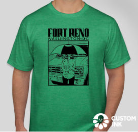 Green Fort Reno T-shirt depicting a person holding an umbrella
